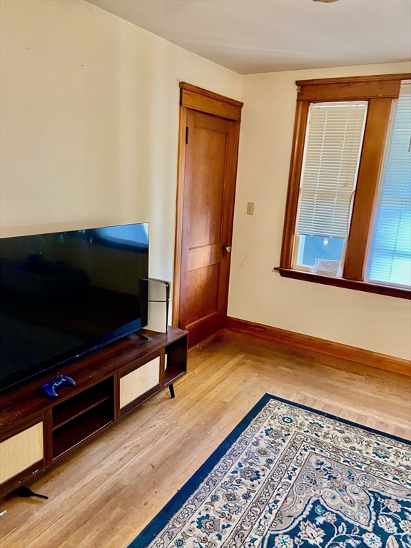 7 3rd Avenue Dudley, MA 01571 - Photo 5 of 19 a living room with furniture and a flat screen tv