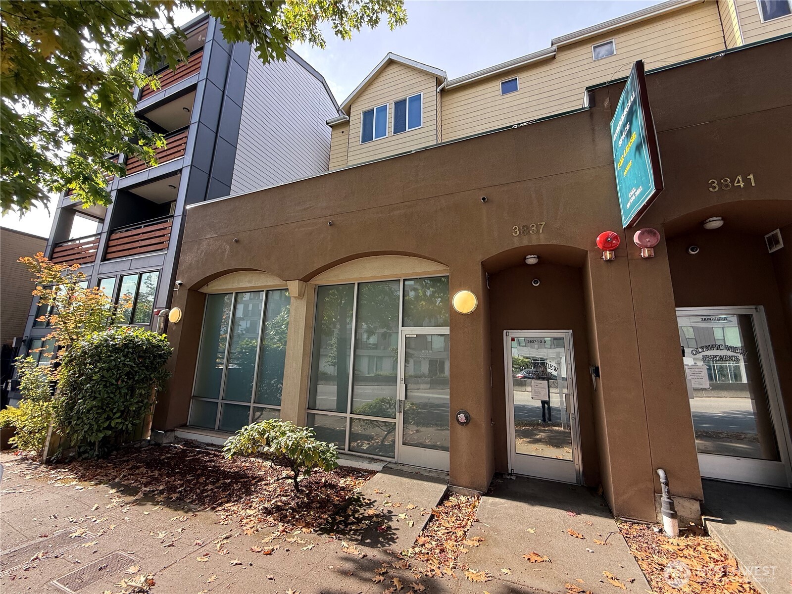 3837 Aurora Avenue North, Unit 100 Seattle, WA 98103 - Photo 1 of 6 a front view of a house