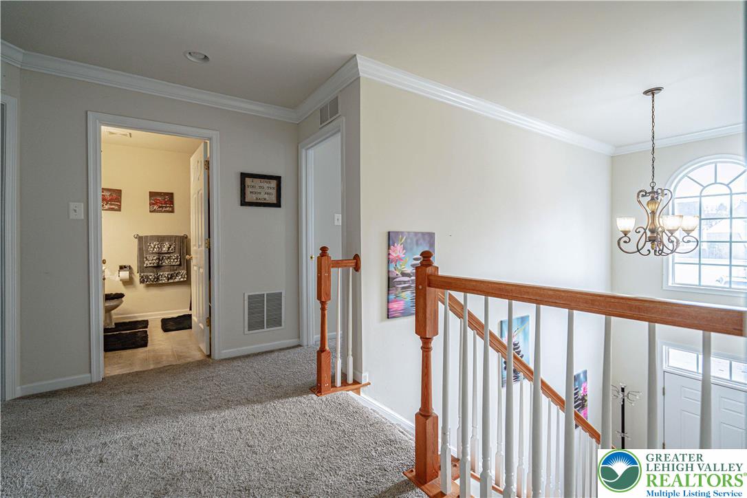 1120 Tyler Way Bethlehem, PA 18017 - Photo 25 of 67 a view of a hallway with windows and stairs