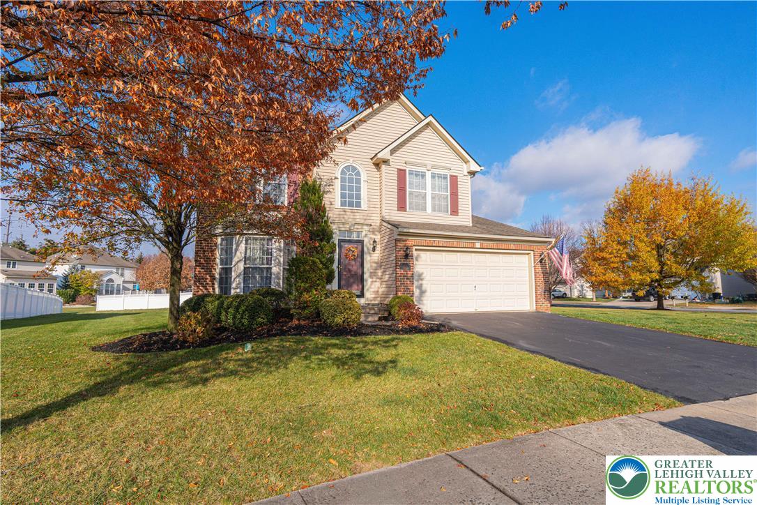 1120 Tyler Way Bethlehem, PA 18017 - Photo 3 of 67 a front view of a house with a yard