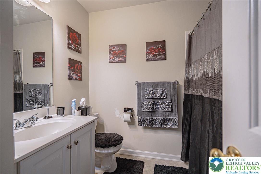1120 Tyler Way Bethlehem, PA 18017 - Photo 39 of 67 a bathroom with a sink toilet and a mirror