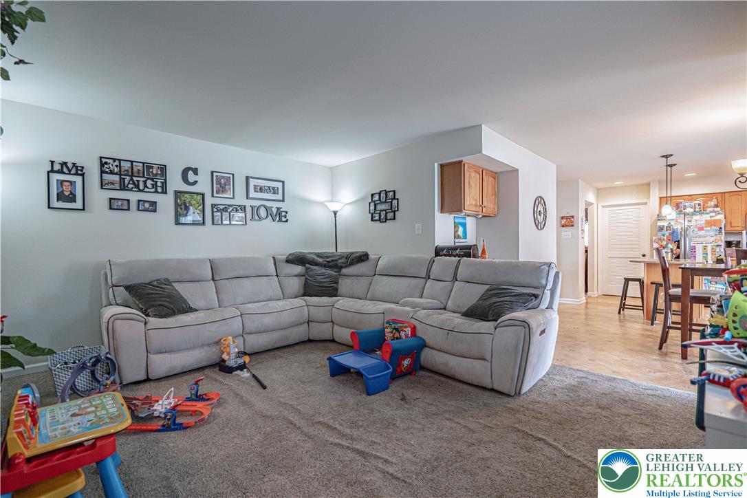 1120 Tyler Way Bethlehem, PA 18017 - Photo 5 of 67 a living room with furniture and white walls