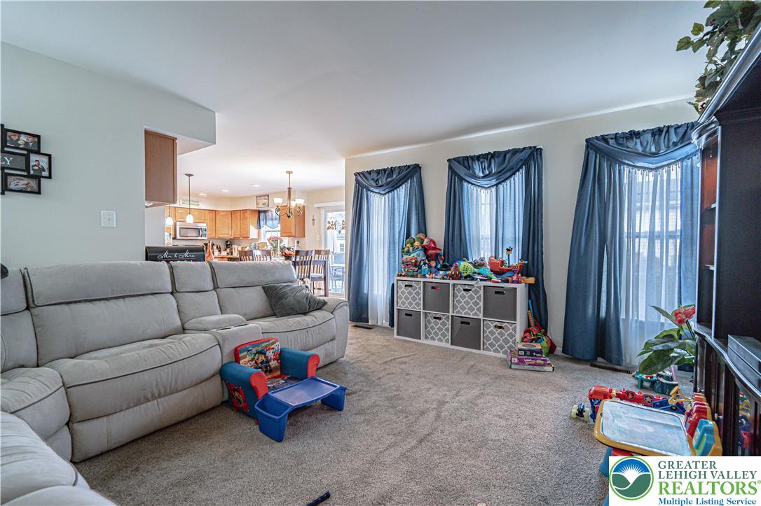 1120 Tyler Way Bethlehem, PA 18017 - Photo 6 of 67 a living room with furniture and a large window