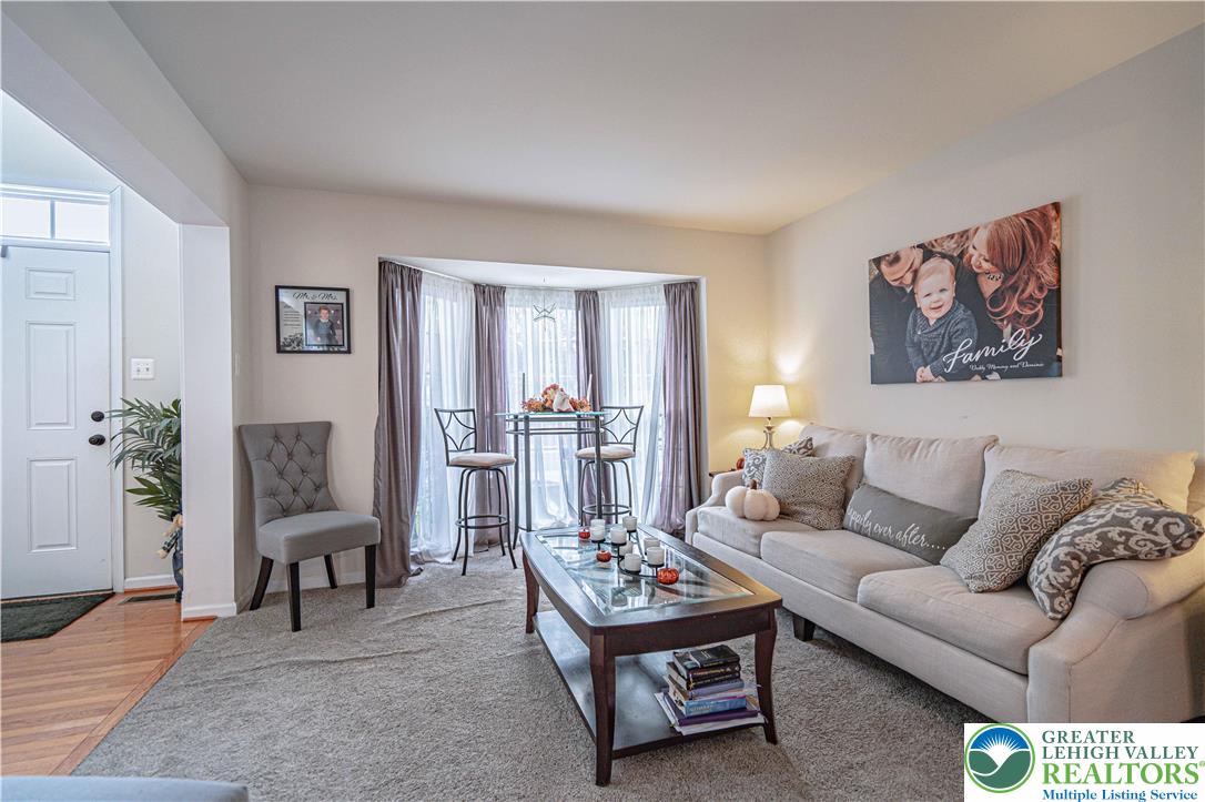 1120 Tyler Way Bethlehem, PA 18017 - Photo 8 of 67 a living room with furniture and a potted plant