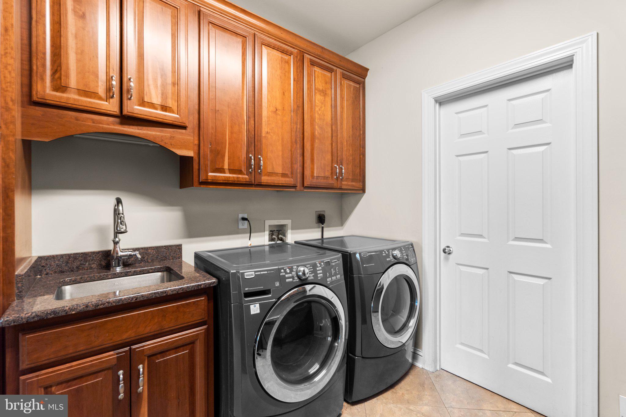 7341 Kehne Road Frederick, MD 21702 - Photo 19 of 67 a utility room with sink dryer and washer
