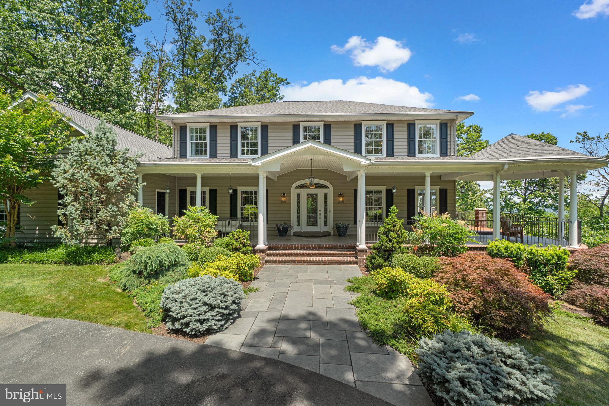 7341 Kehne Road Frederick, MD 21702 - Photo 2 of 67 a front view of a house with garden