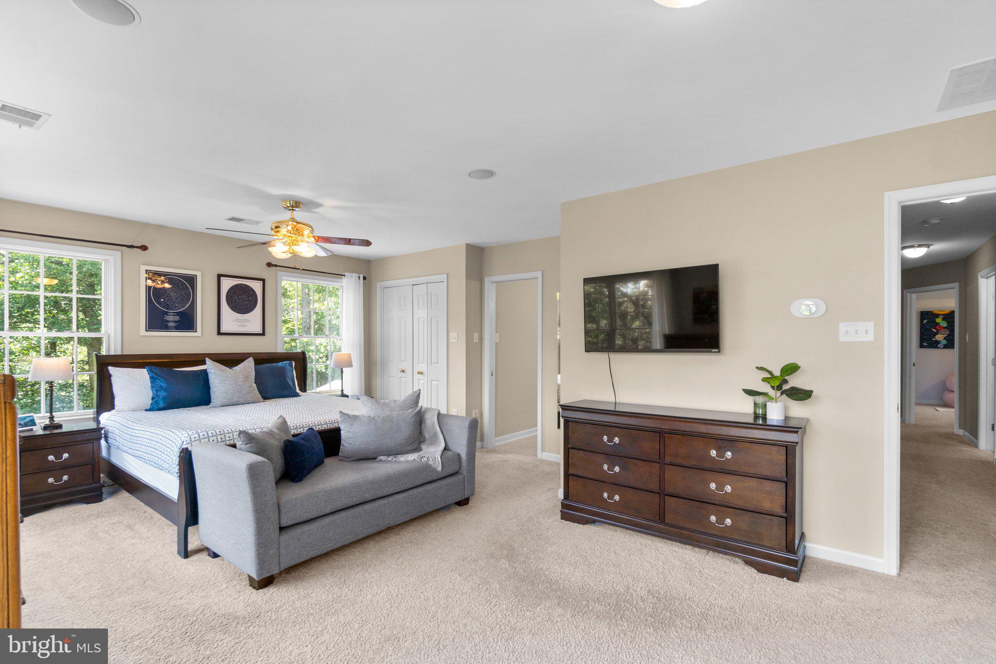 7341 Kehne Road Frederick, MD 21702 - Photo 21 of 67 a living room with furniture and a flat screen tv