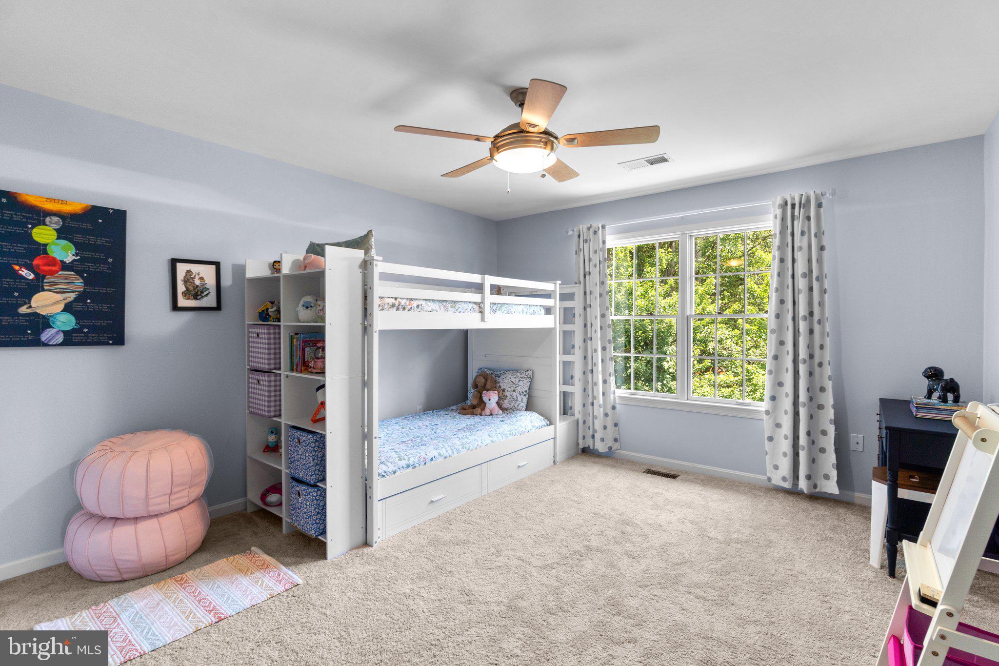 7341 Kehne Road Frederick, MD 21702 - Photo 28 of 67 a bedroom with a bed and a chair