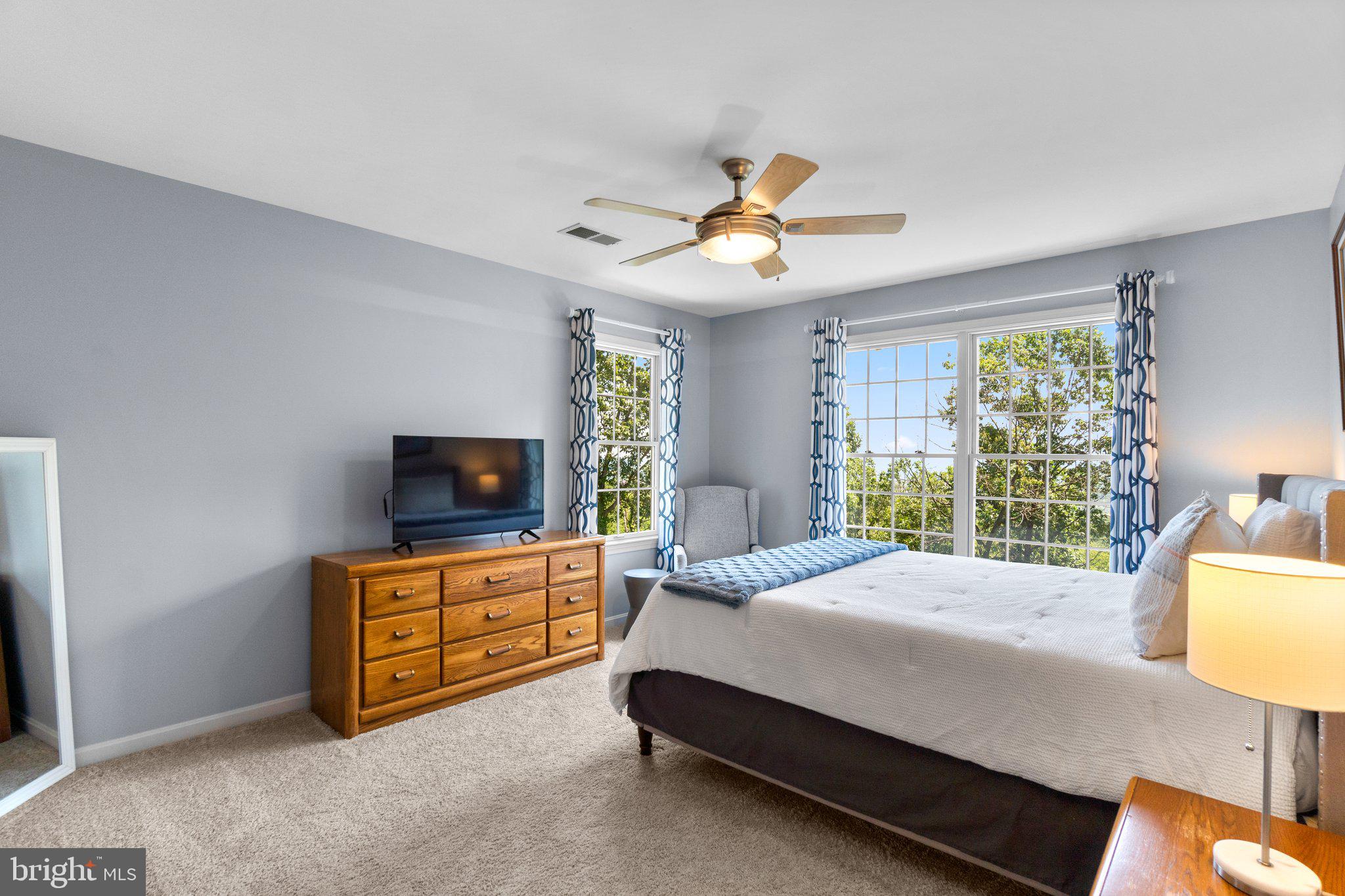 7341 Kehne Road Frederick, MD 21702 - Photo 34 of 67 a bedroom with a bed and a flat screen tv