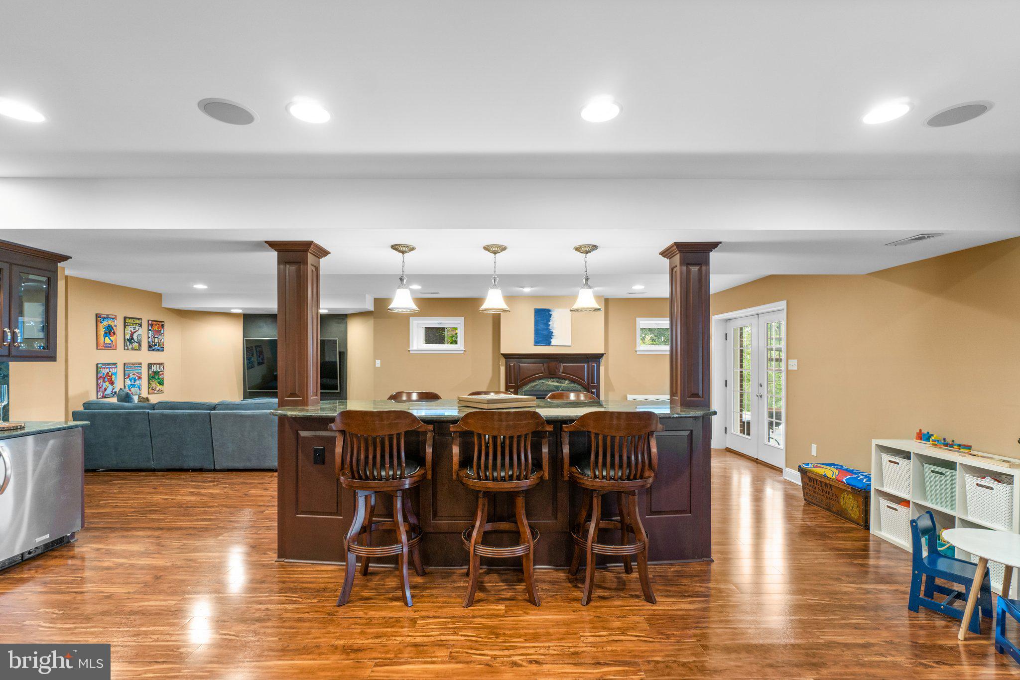 7341 Kehne Road Frederick, MD 21702 - Photo 39 of 67 a view of a dining room with furniture window and wooden floor