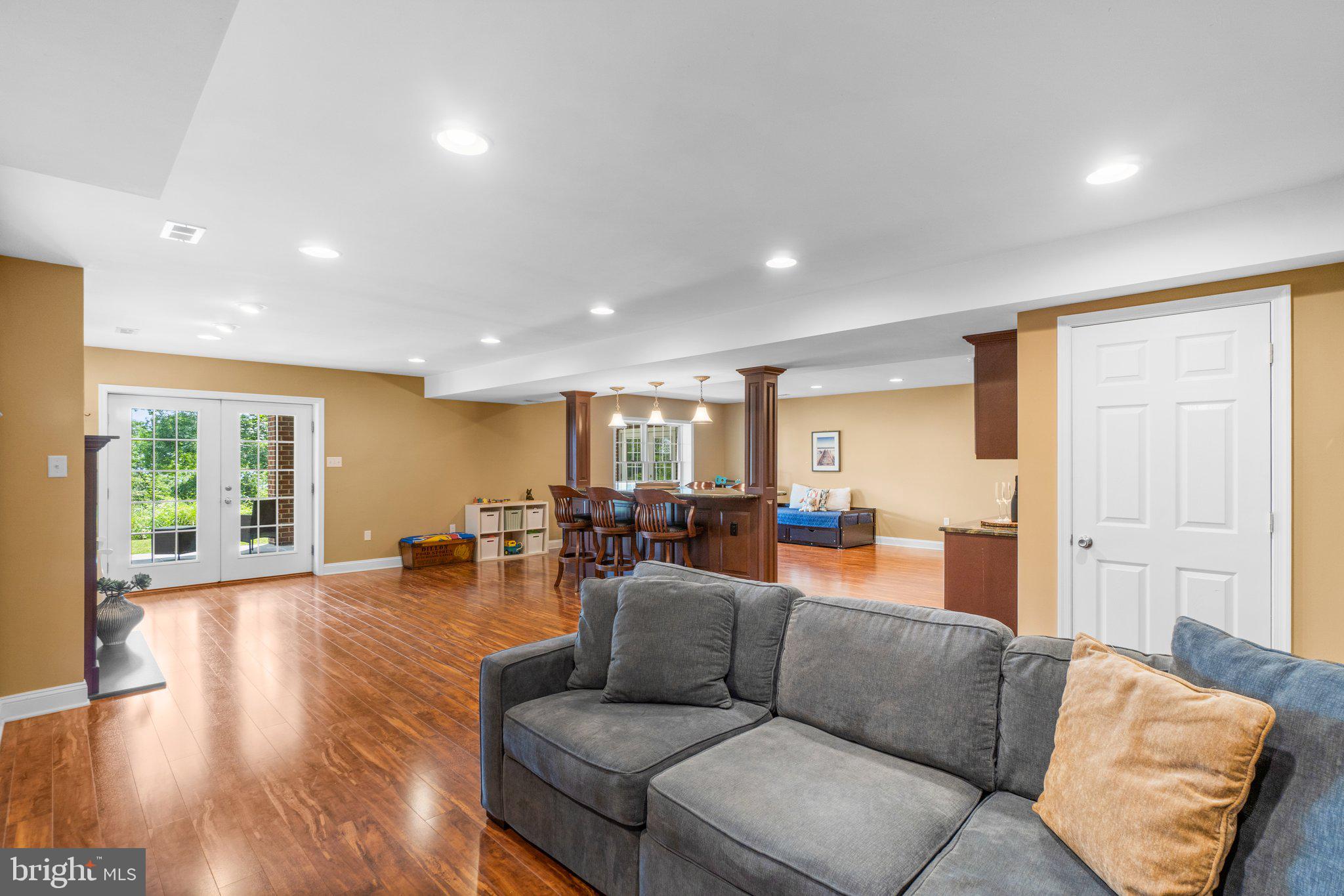 7341 Kehne Road Frederick, MD 21702 - Photo 42 of 67 a living room with furniture and wooden floor