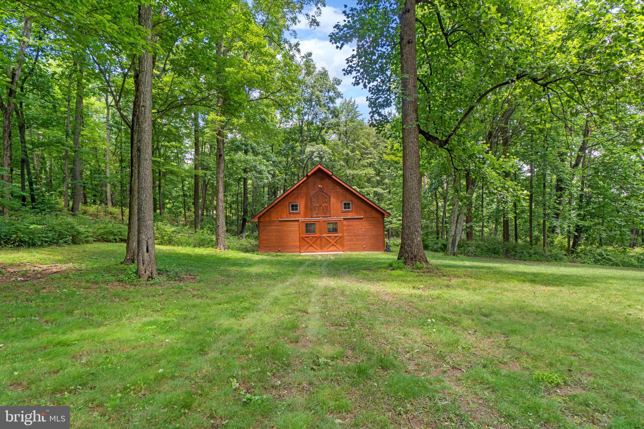 7341 Kehne Road Frederick, MD 21702 - Photo 59 of 67 a barn with a big yard and large trees