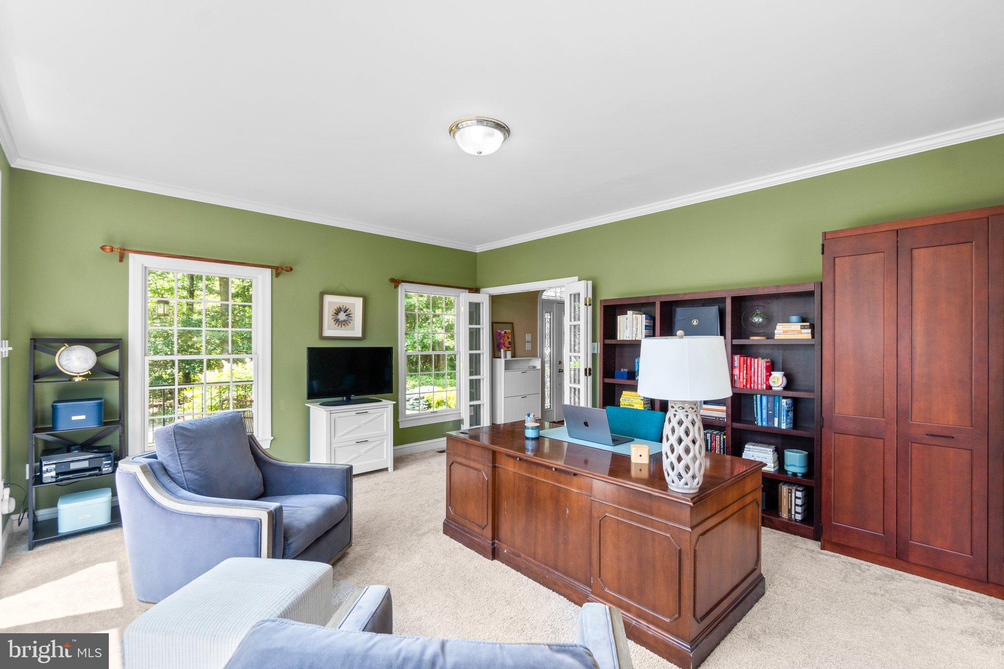 7341 Kehne Road Frederick, MD 21702 - Photo 6 of 67 a living room with furniture and a flat screen tv