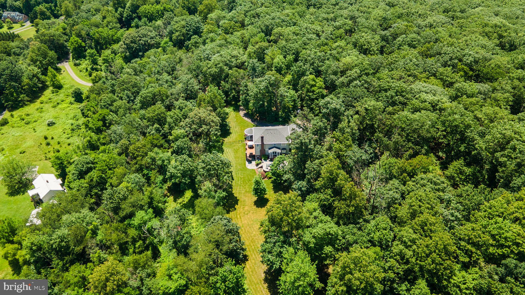 7341 Kehne Road Frederick, MD 21702 - Photo 67 of 67 an aerial view of residential house with outdoor space and trees all around