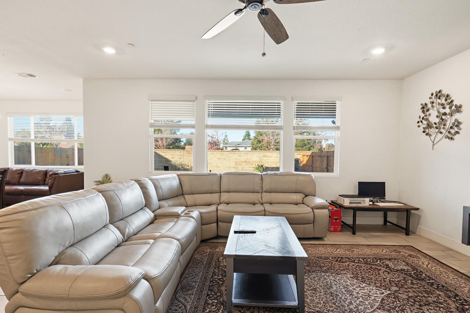 2367 Explorador Drive Merced, CA 95340 - Photo 11 of 42 a living room with furniture and a large window