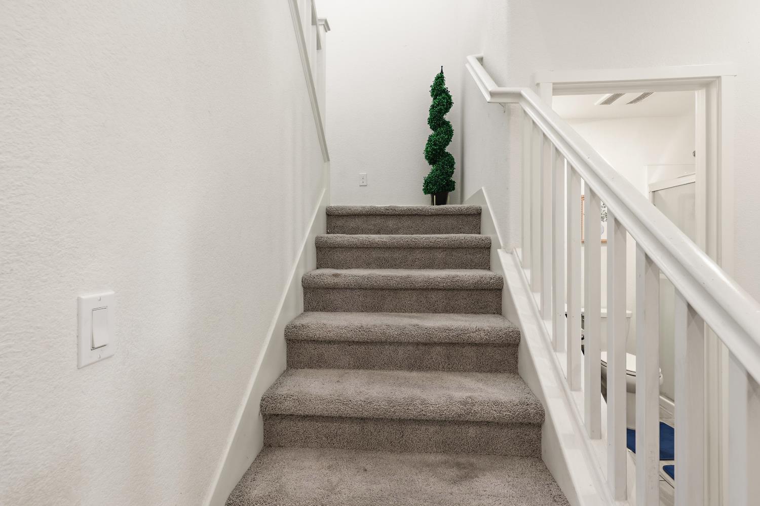 2367 Explorador Drive Merced, CA 95340 - Photo 18 of 42 a view of staircase with white walls