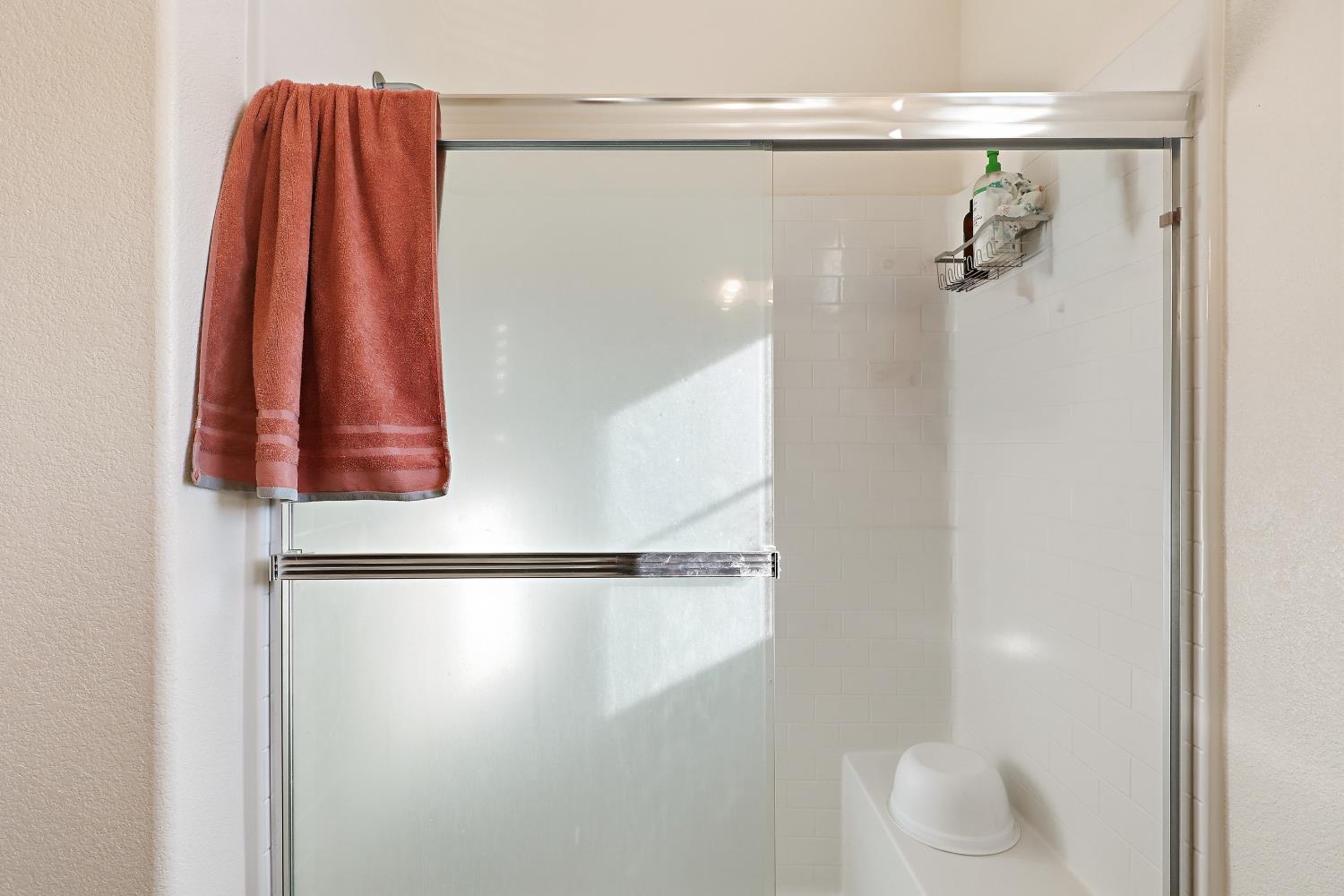 2367 Explorador Drive Merced, CA 95340 - Photo 23 of 42 a bathroom with a shower and a toilet