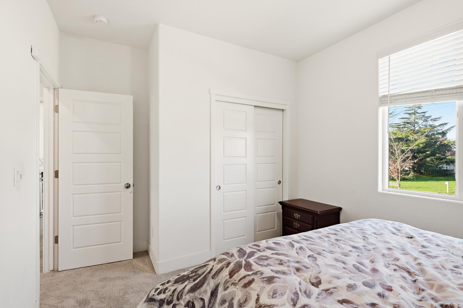 2367 Explorador Drive Merced, CA 95340 - Photo 25 of 42 a bedroom with a bed and a window