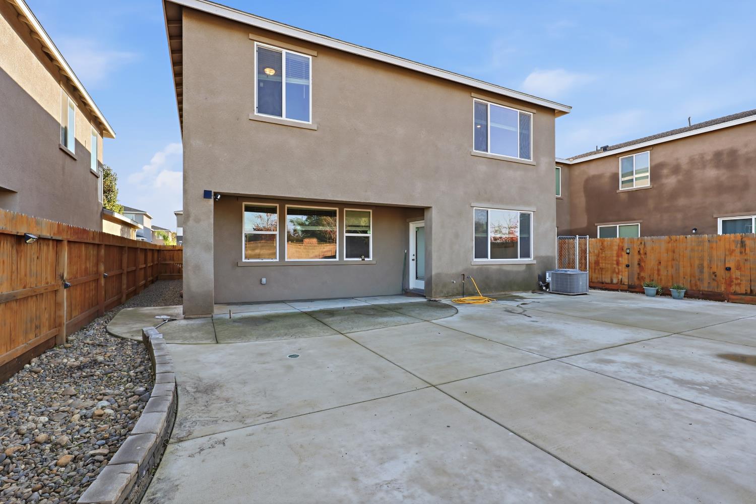 2367 Explorador Drive Merced, CA 95340 - Photo 35 of 42 a view of a house with a backyard