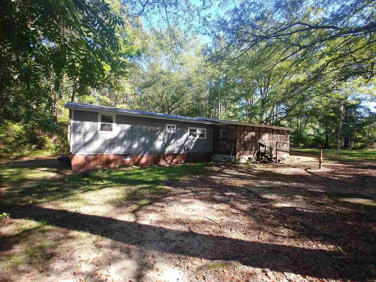 1213 Gills Point Road Tignall, GA 30668 - Photo 1 of 1 a view of backyard with green space