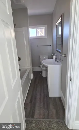 a view of hallway with windows