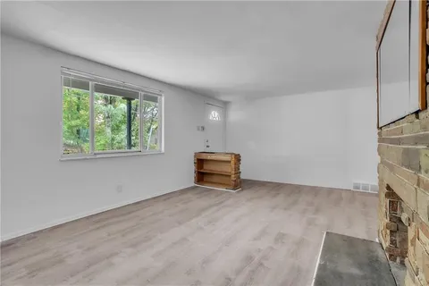 a view of a kitchen with a sink and dishwasher