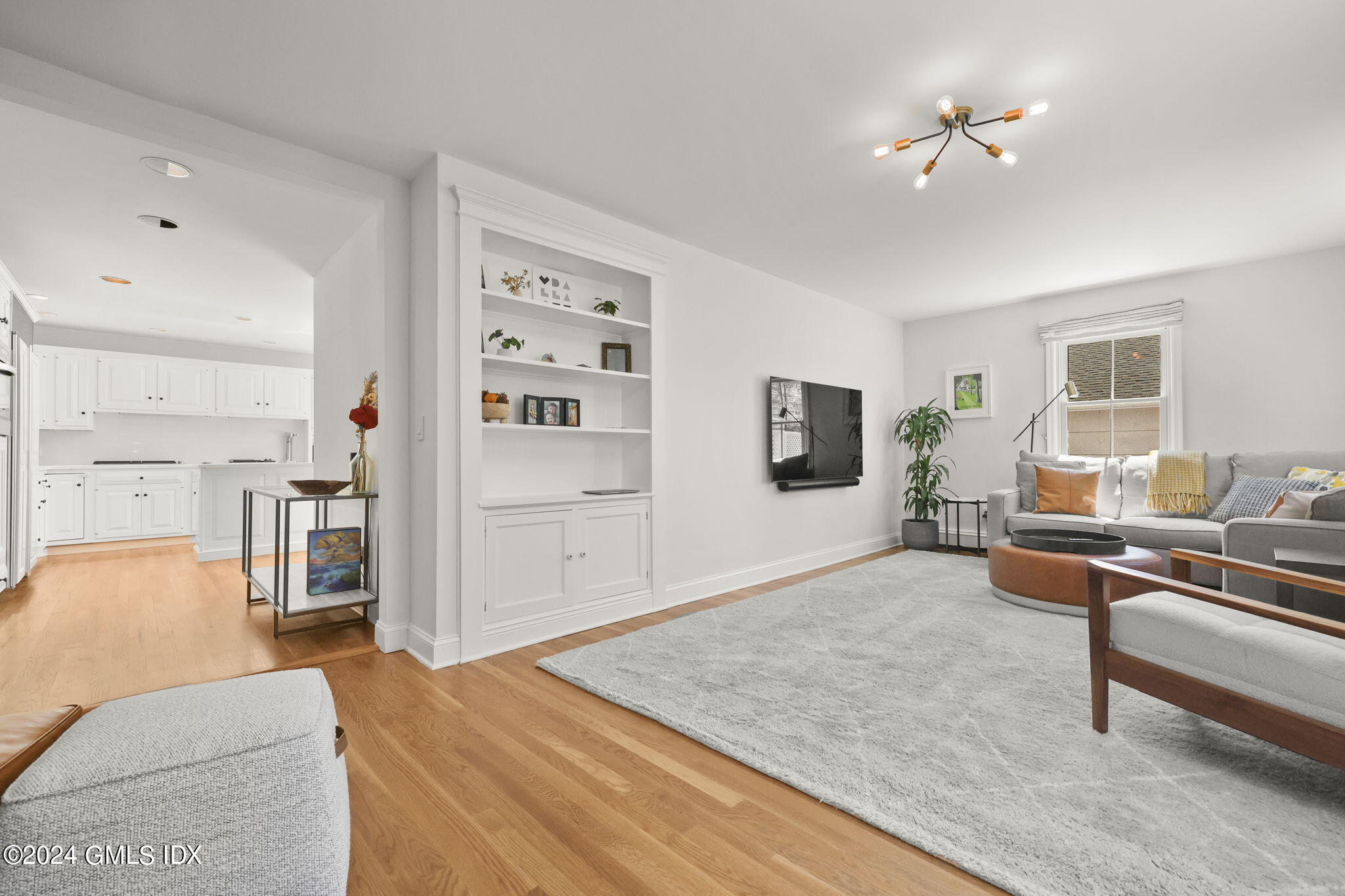 72 Lockwood Road Riverside, CT 06878 - Photo 17 of 51 a living room with furniture and a flat screen tv