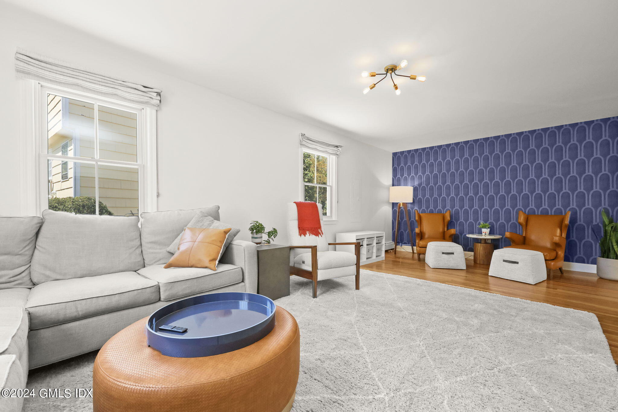 72 Lockwood Road Riverside, CT 06878 - Photo 18 of 51 a living room with furniture and a large window