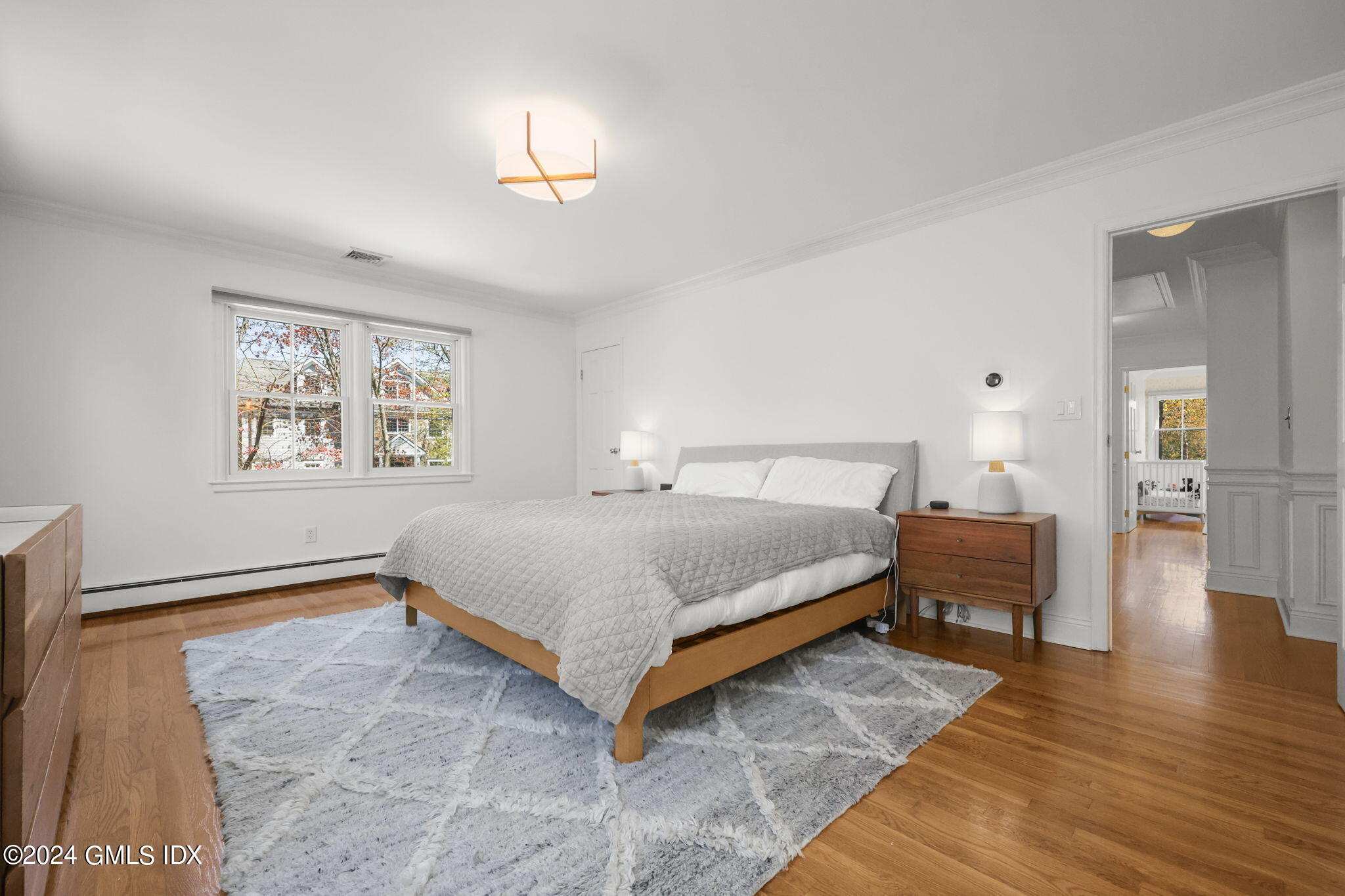 72 Lockwood Road Riverside, CT 06878 - Photo 25 of 51 a bedroom with a bed and a couch