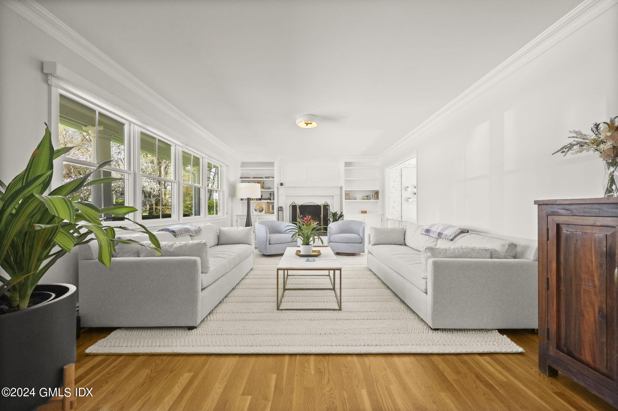 72 Lockwood Road Riverside, CT 06878 - Photo 3 of 51 a living room with furniture and a large window