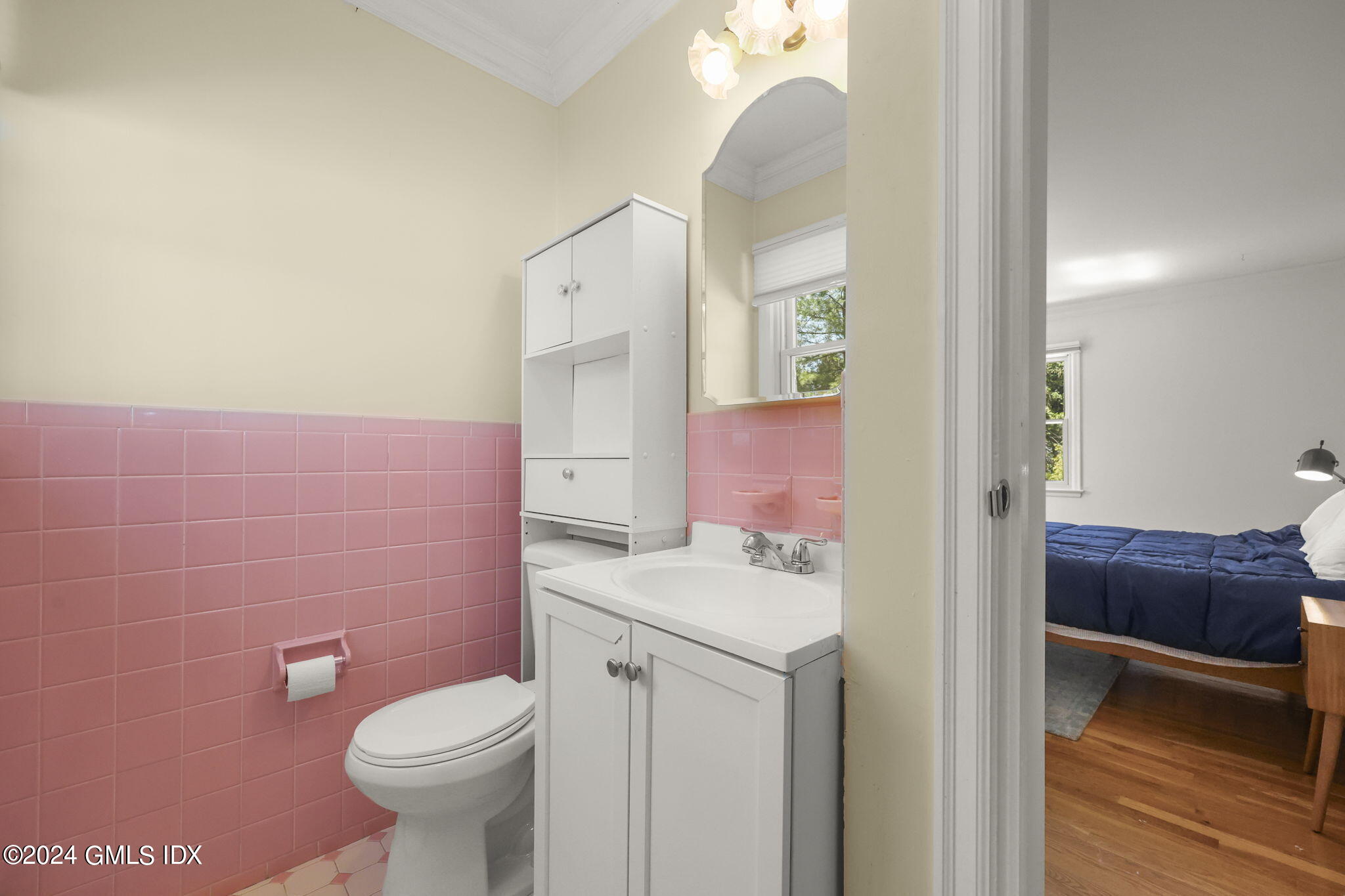 72 Lockwood Road Riverside, CT 06878 - Photo 31 of 51 a bathroom with a sink a toilet and a mirror