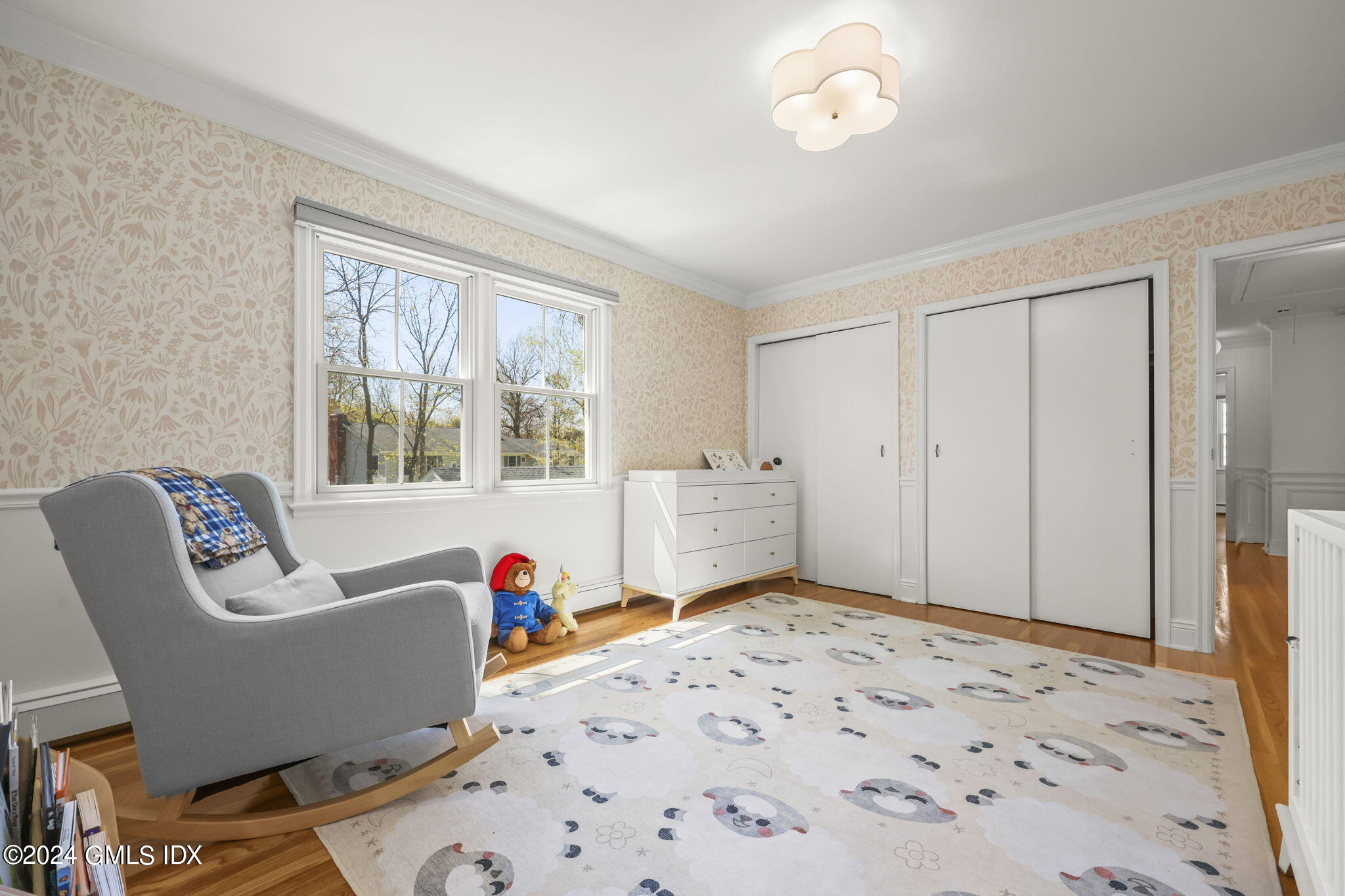 72 Lockwood Road Riverside, CT 06878 - Photo 34 of 51 a bedroom with furniture and a window