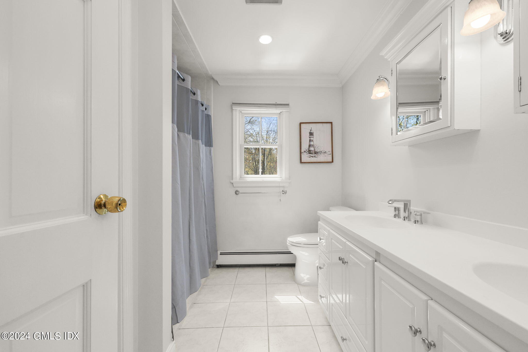 72 Lockwood Road Riverside, CT 06878 - Photo 38 of 51 a bathroom with a sink a toilet and shower