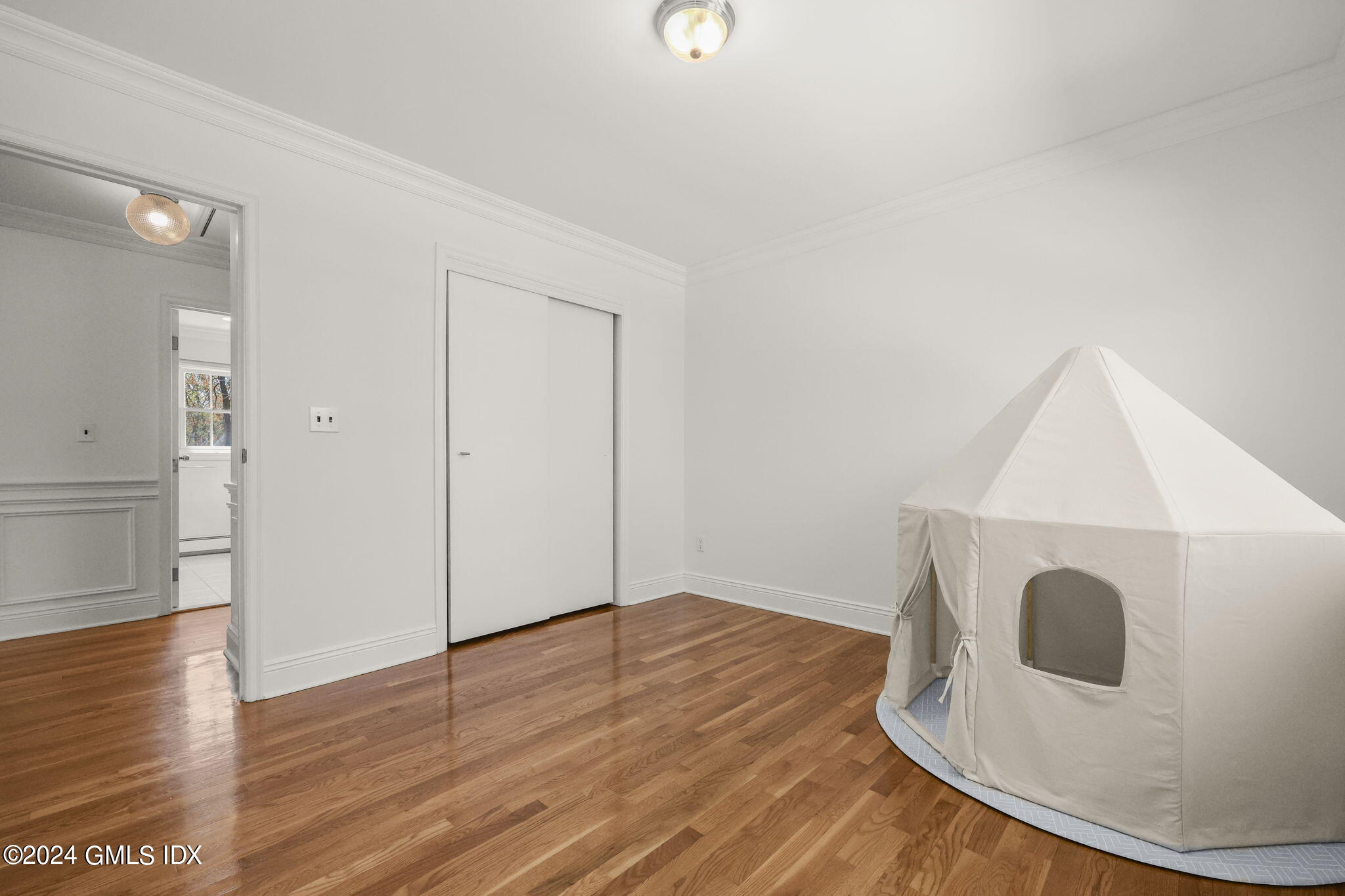 72 Lockwood Road Riverside, CT 06878 - Photo 41 of 51 a view of livingroom with wooden floor