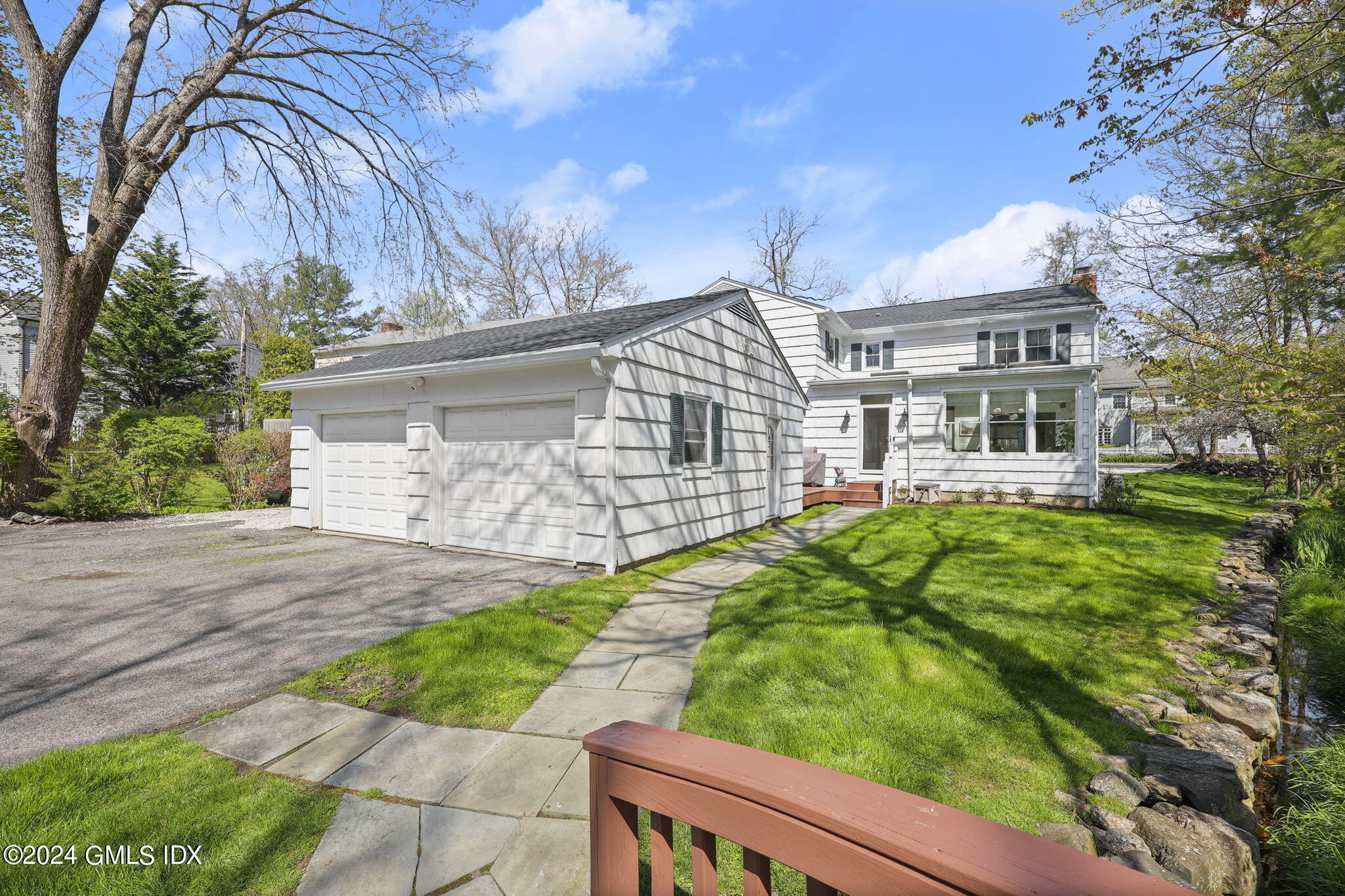 72 Lockwood Road Riverside, CT 06878 - Photo 45 of 51 a view of a house with a yard
