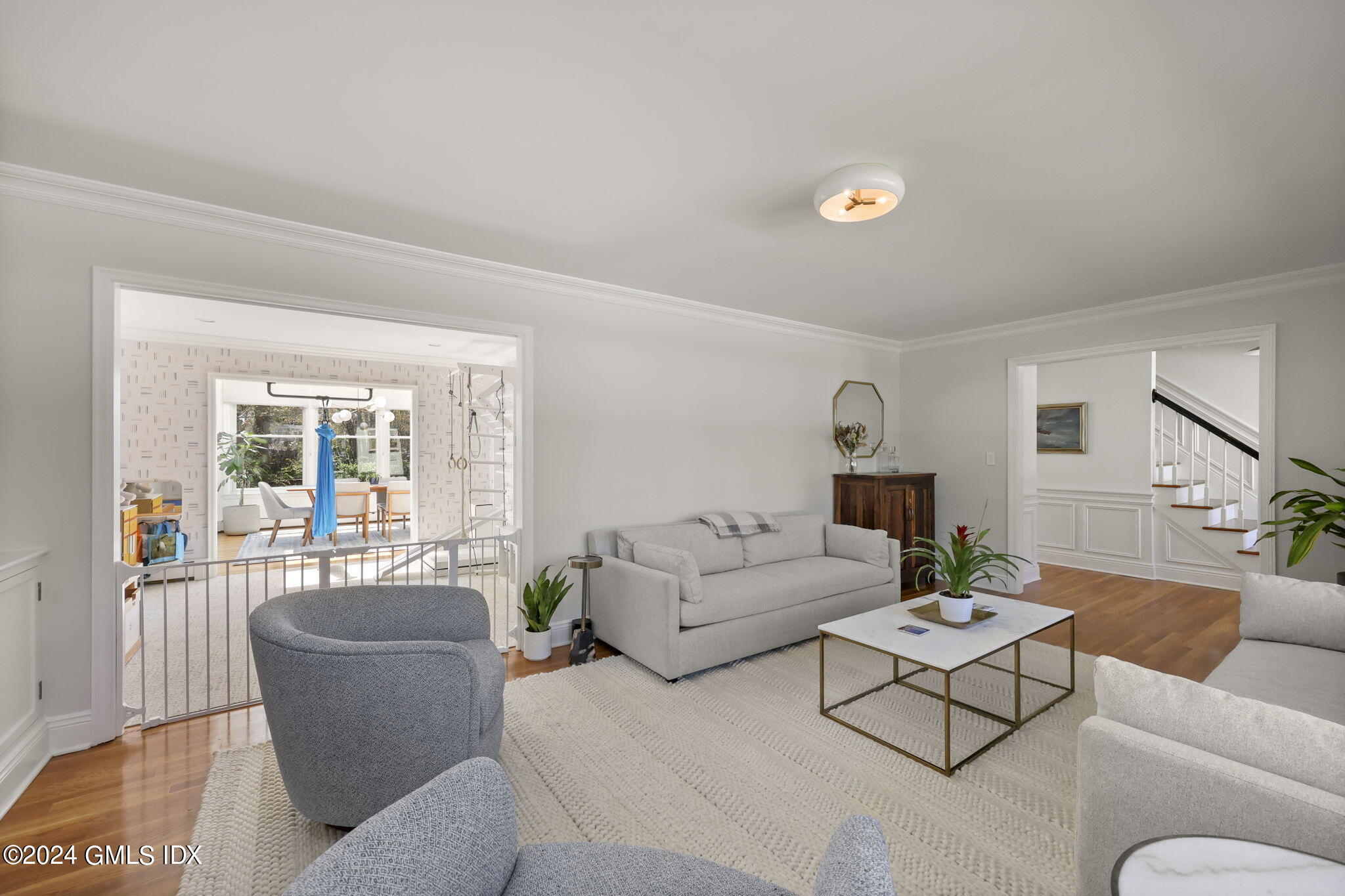 72 Lockwood Road Riverside, CT 06878 - Photo 5 of 51 a living room with furniture and a large window