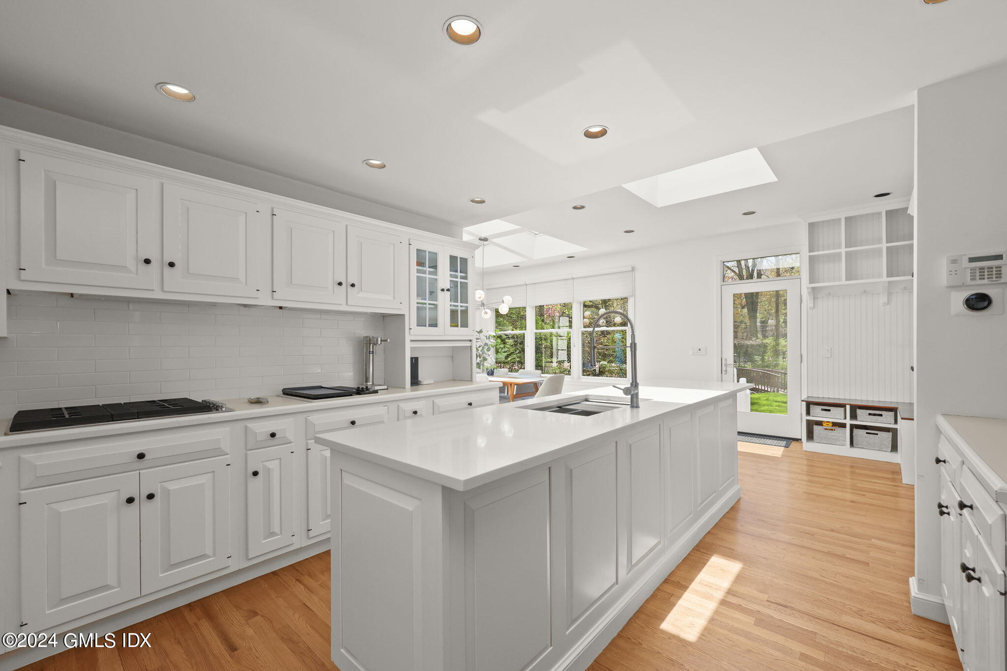 72 Lockwood Road Riverside, CT 06878 - Photo 7 of 51 a kitchen with a sink stove and cabinets