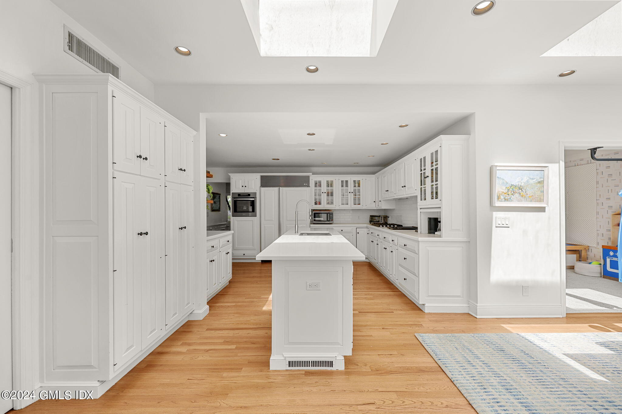 72 Lockwood Road Riverside, CT 06878 - Photo 10 of 51 a very nice looking living room with wooden floor