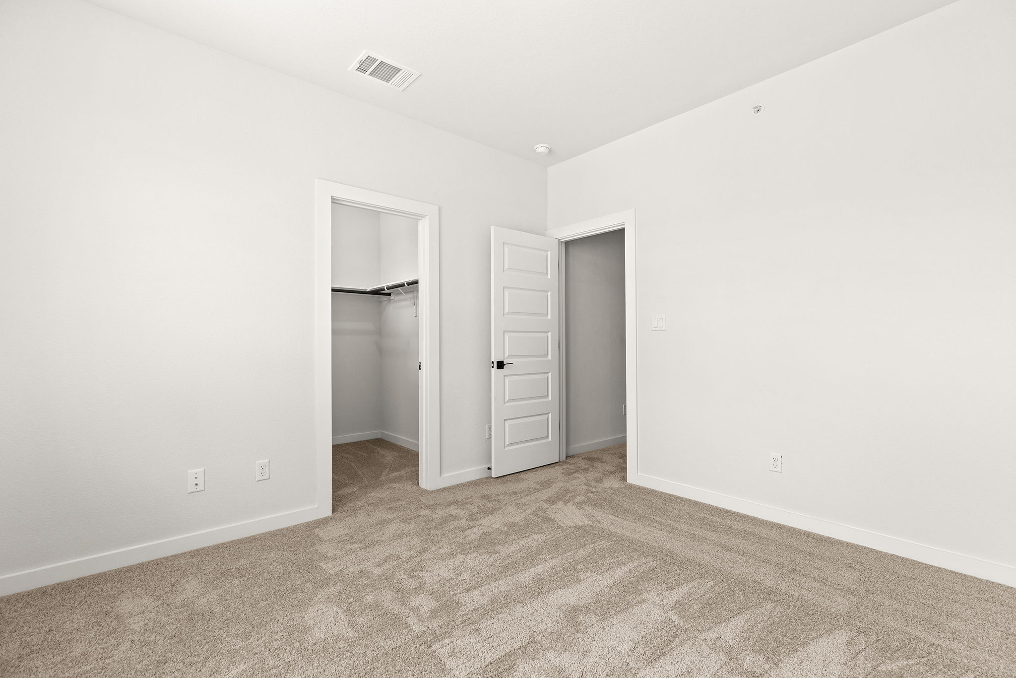 2600 Gattis School Road, Unit 1002 Round Rock, TX 78664 - Photo 28 of 40 An inviting bedroom offers ample space, soft carpeting, and convenient closet access.
