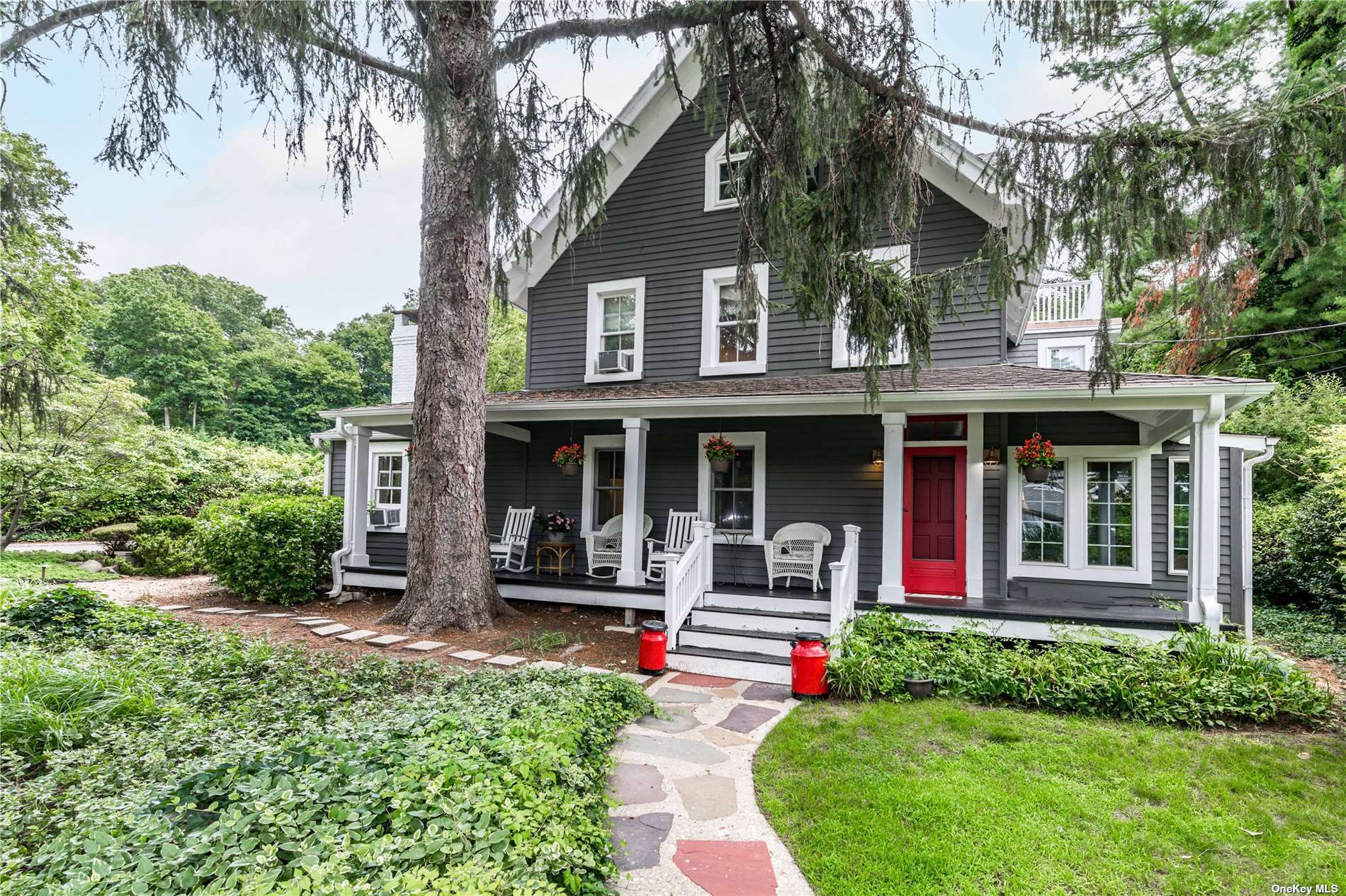 front view of a house with a small yard