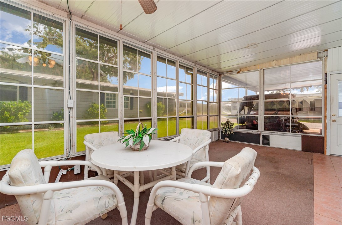 5 Aloe Alva, FL 33920 - Photo 22 of 37 a view of a dining room with furniture window and outside view