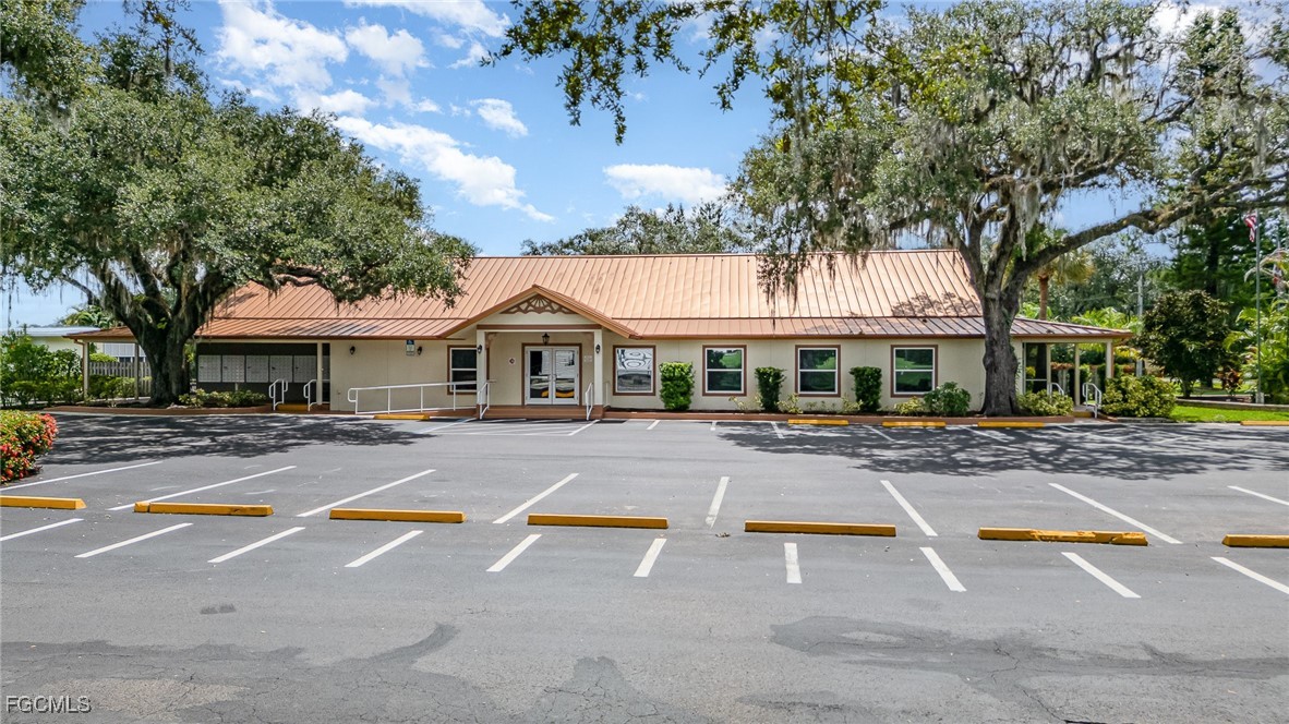5 Aloe Alva, FL 33920 - Photo 27 of 37 a view of house with outdoor space and swimming pool