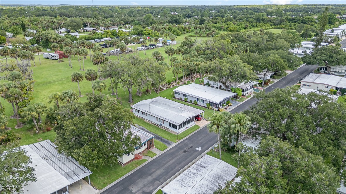 5 Aloe Alva, FL 33920 - Photo 28 of 37 an aerial view of a house with a garden