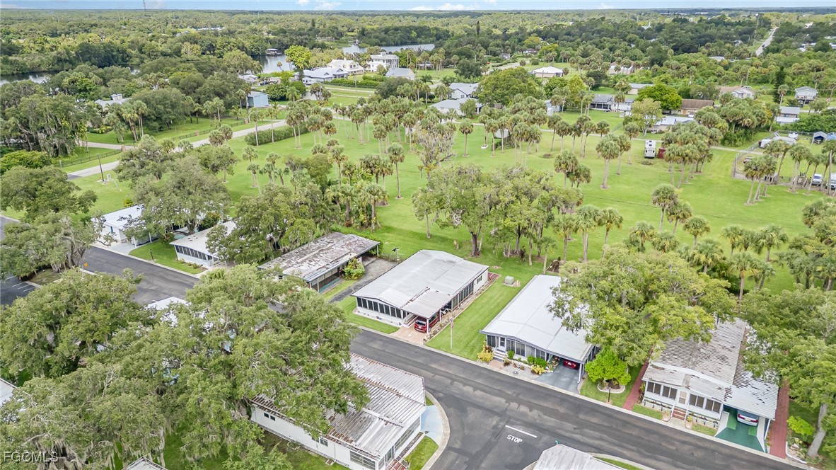 5 Aloe Alva, FL 33920 - Photo 29 of 37 an aerial view of a city with lots of residential buildings