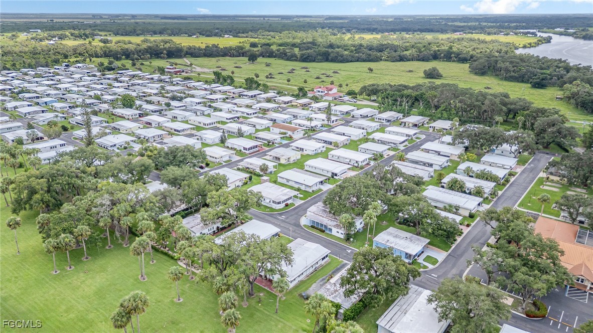 5 Aloe Alva, FL 33920 - Photo 30 of 37 an aerial view of a houses with a yard