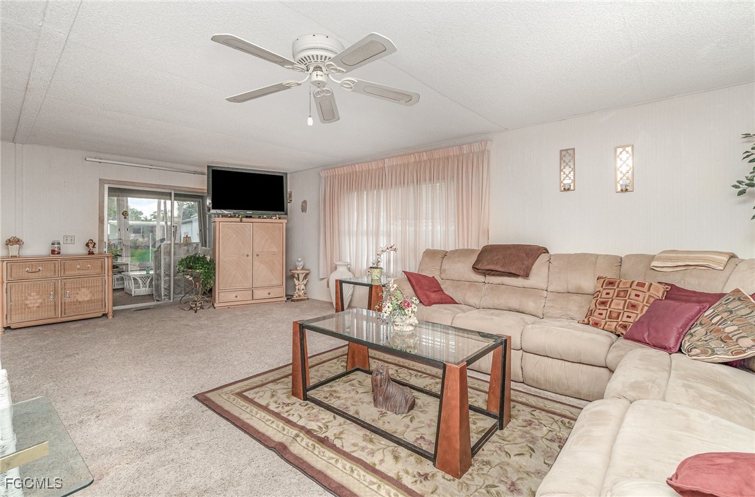 5 Aloe Alva, FL 33920 - Photo 4 of 37 a living room with furniture and a flat screen tv