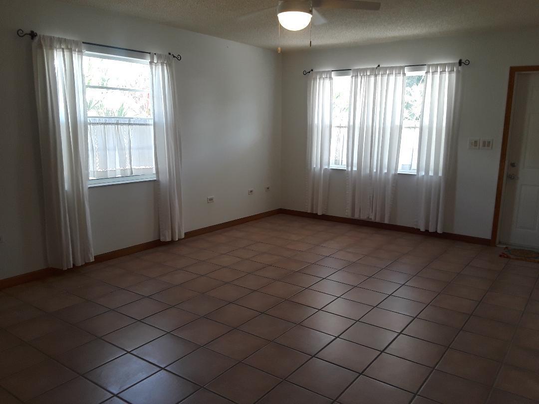 14 Jewfish Avenue Key Largo, FL 33037 - Photo 12 of 44 an empty room with windows