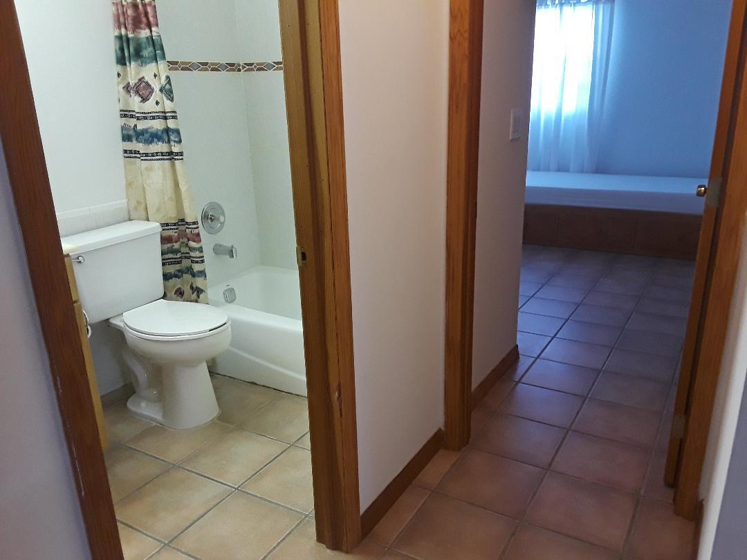14 Jewfish Avenue Key Largo, FL 33037 - Photo 15 of 44 a bathroom with a toilet and a sink