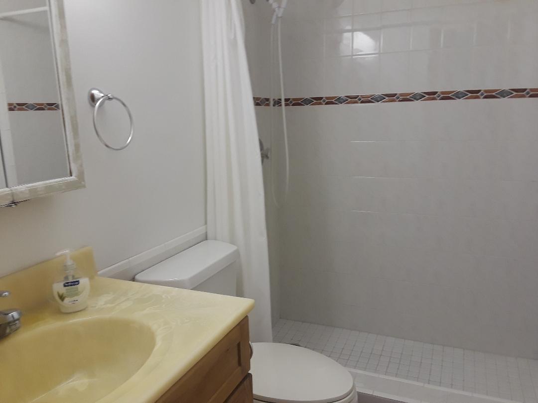 14 Jewfish Avenue Key Largo, FL 33037 - Photo 20 of 44 a bathroom with a sink toilet and shower