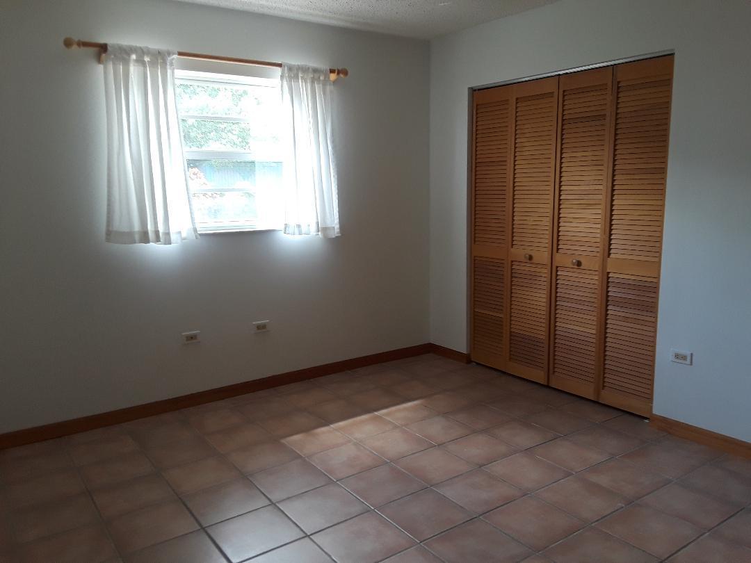 14 Jewfish Avenue Key Largo, FL 33037 - Photo 22 of 44 an empty room with windows